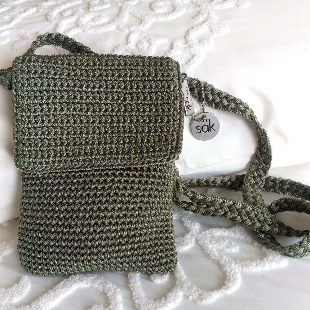 The Sak crocheted Sage Green Crossbody Mini Bag